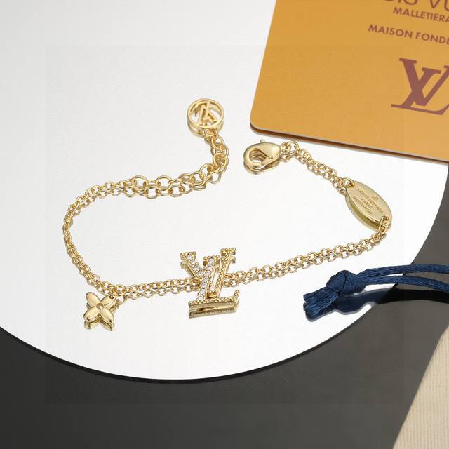 Exquisitely crafted Louis Vuitton monogram bracelet. The polished finish perfect