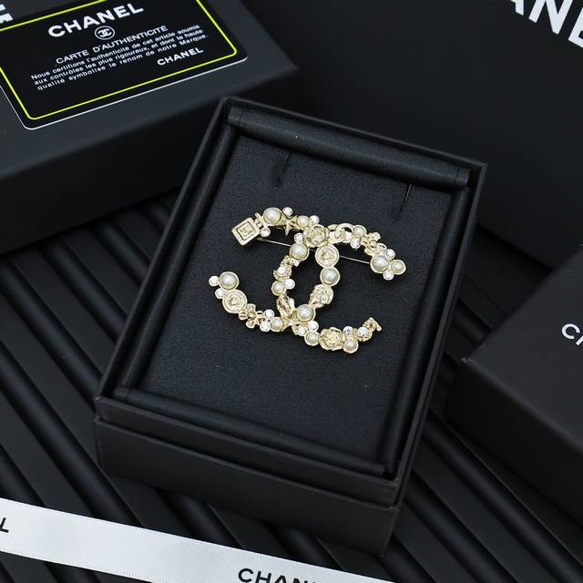 Chanel Double C Multi-Element Brooch The double C paired with pearl elements is