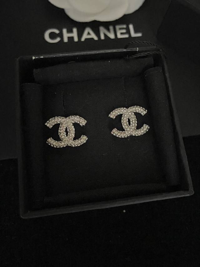 Chanel Silver Cc Full Diamond Stud Earrings! Details include the logo. A best-se