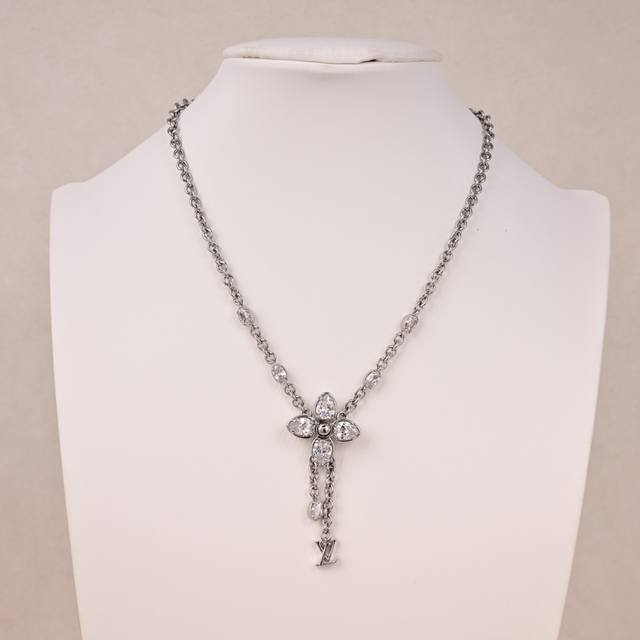 This necklace is absolutely gorgeous! It's a high-end custom-made Louis Vuitton