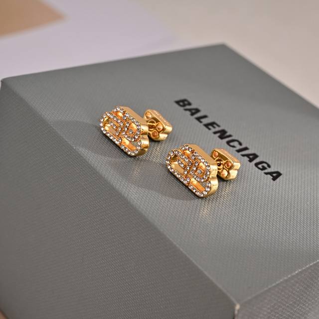 Original Balenciaga new earrings, identical to those in boutiques, made of brass