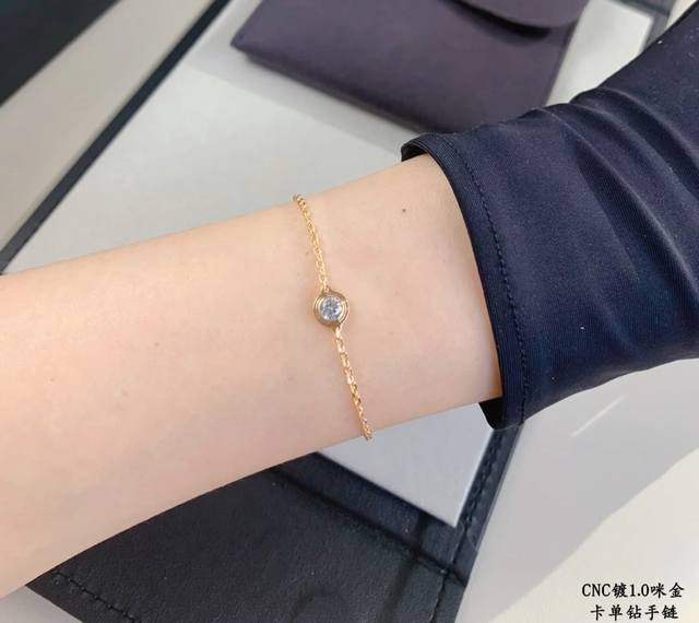 V Gold Plated Cartier Solitaire Diamond Bracelet. A classic piece; its delicate