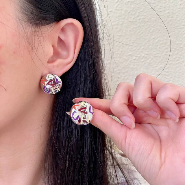 Chanel Vintage Double C Earrings Original Replica Logo. Chanel's designs truly n