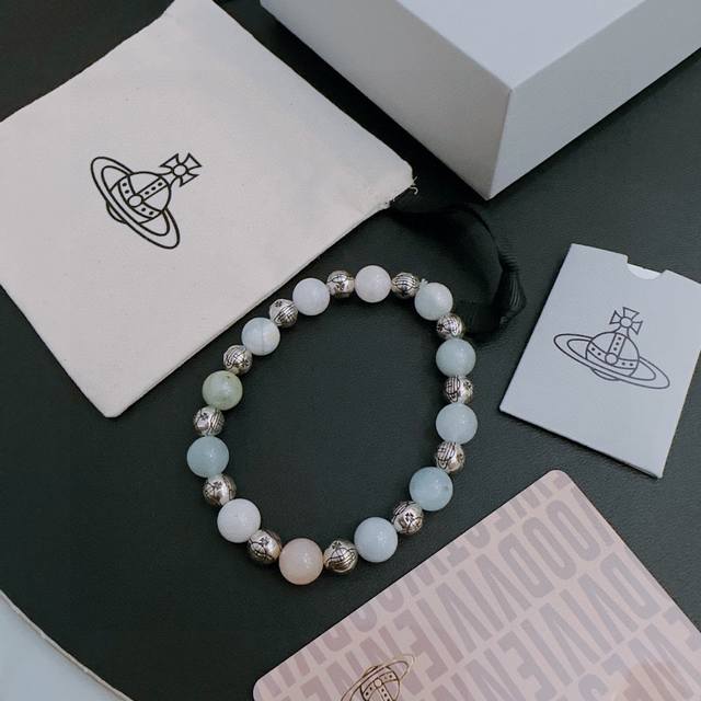 A high-quality replica of a Thai silver bracelet featuring multiple natural ston