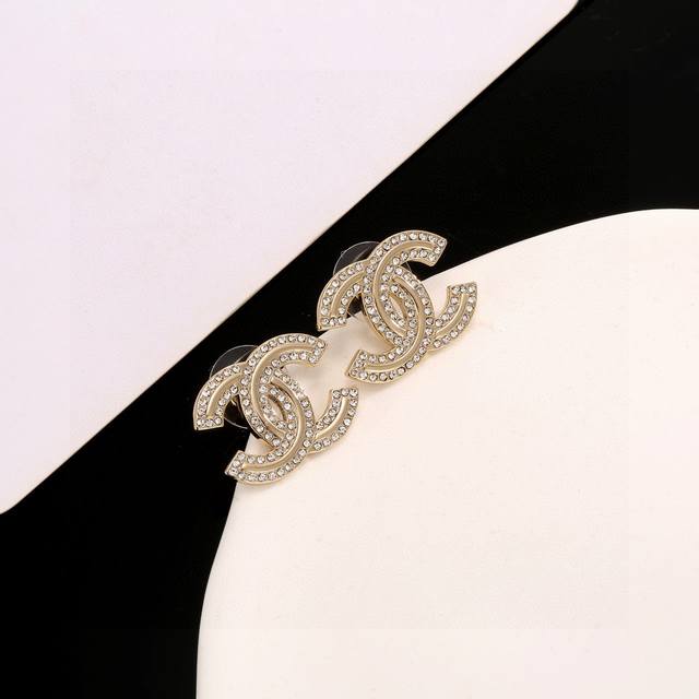 Chanel's hottest gold stud earrings, the most classic style, bar none. These ele