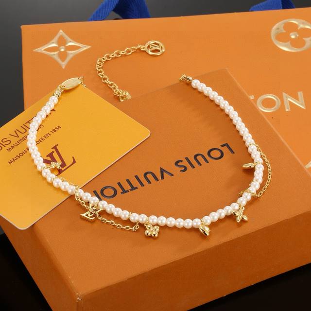 Louis Vuitton Letter Pearl Necklace. Crafted with exquisite workmanship, the pol