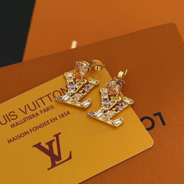 These exquisitely crafted Louis Vuitton earrings embody superb craftsmanship, us