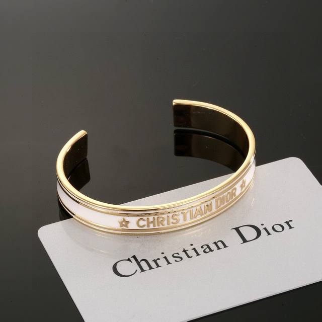 Dior's new open bangle is gorgeous! It's versatile and can be worn as a layering