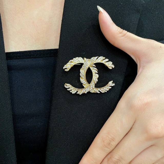 Chanel's newest brooches are now available at boutiques. Chanel brooches are the