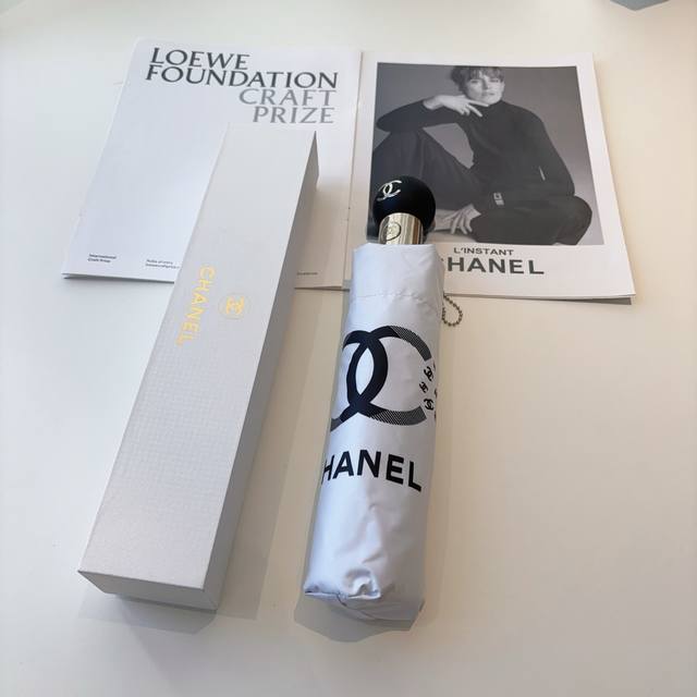 Chanel 3-fold automatic folding umbrella. The design, incorporating the iconic C