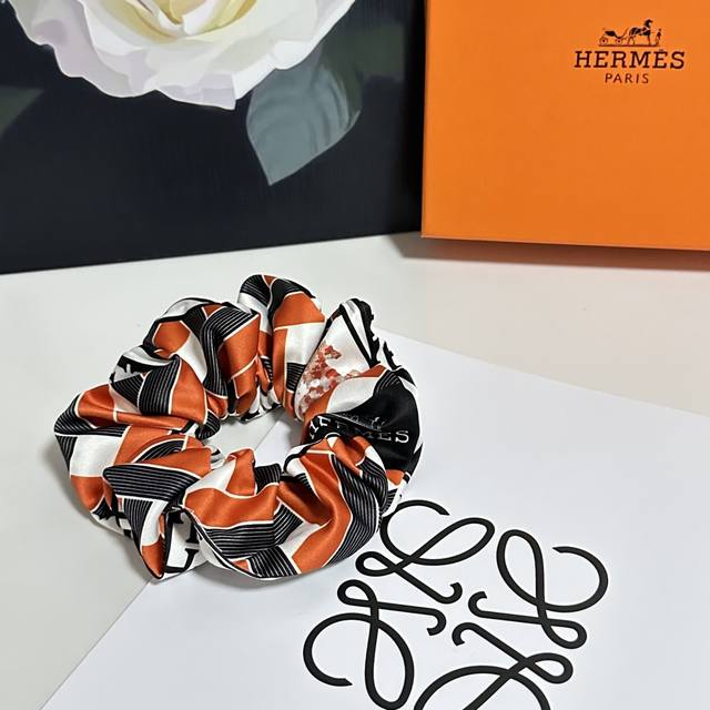 Special offer: Individually packaged with full packaging. Hermes silk hair tie,