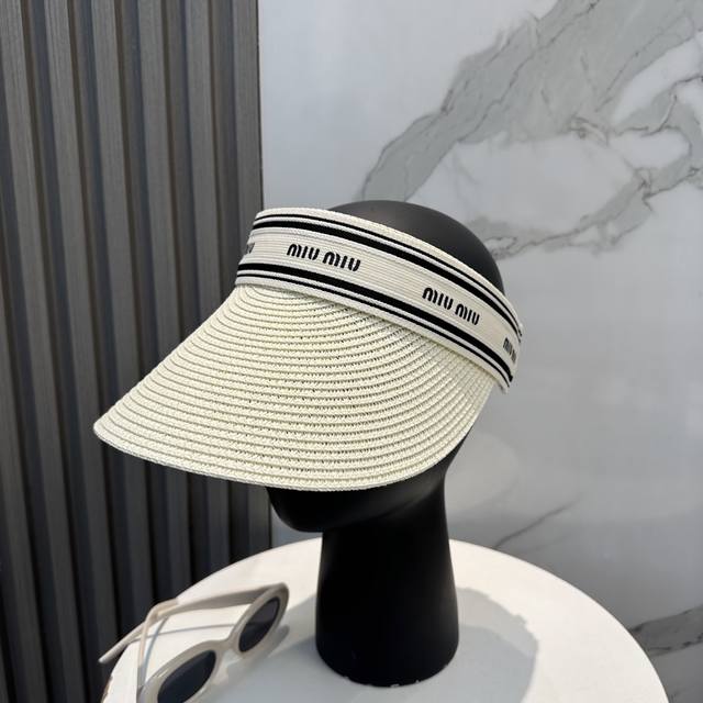 Miu Miu Miu visor hat with dust bag. A must-have item for summer because it's so