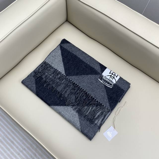 Top Quality. This piece features Saturn, a favorite of British punk icon Vivienn