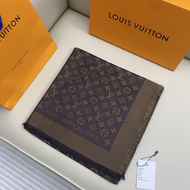 Monogram Shine Shawl: Made with select dyed silk threads and soft lourex metalli