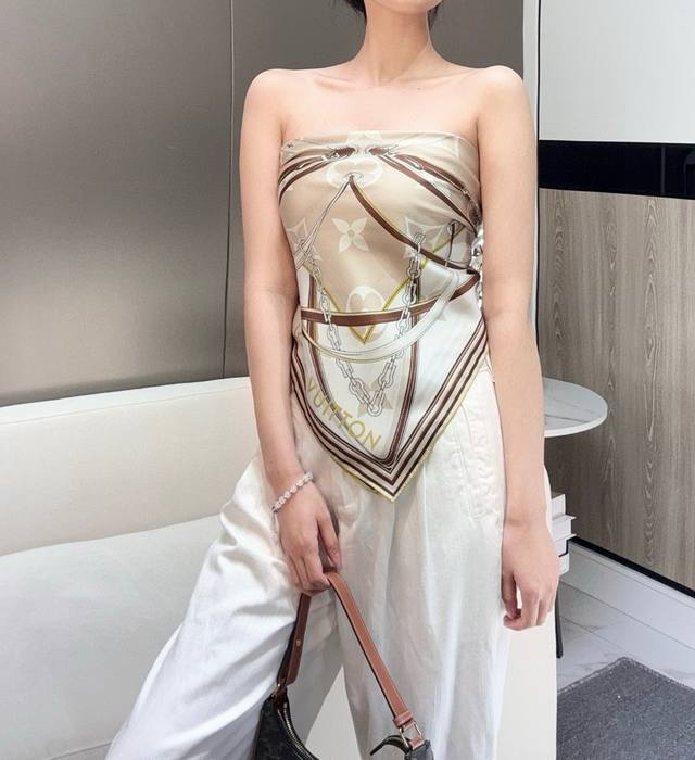 This LV silk scarf is incredibly soft; you can tie it however you like and creat