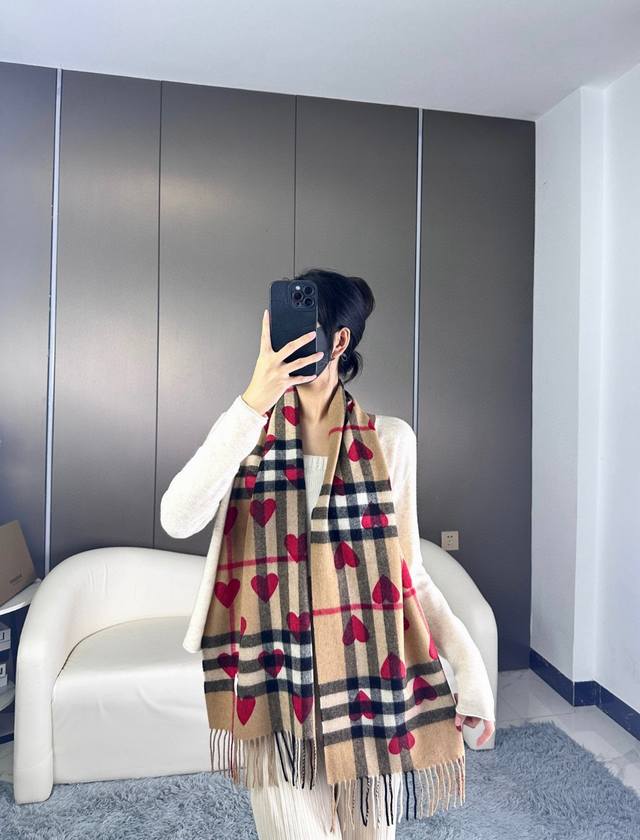 Burberry's classic cashmere heart scarf is a year-round staple, a must-have in a