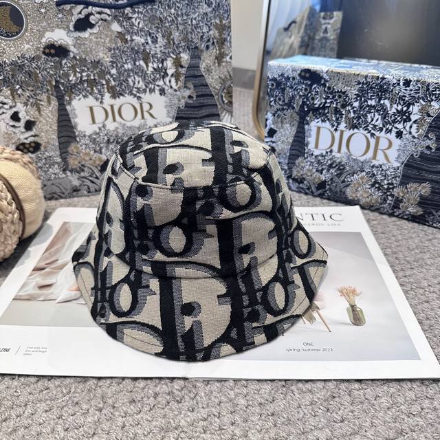 Dior's latest monogram Dior logo bucket hat from the official website. Extremely