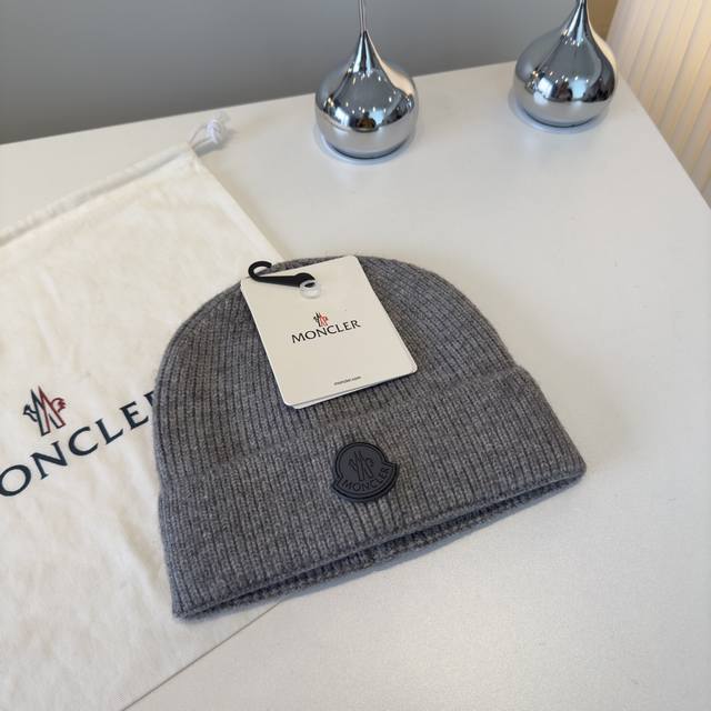 Moncler beanie, a classic and versatile style.