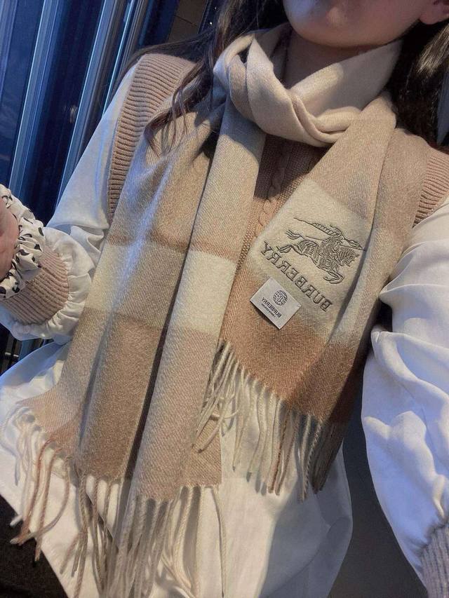 100% cashmere, stunning! Beautiful whether draped over your shoulders or wrapped