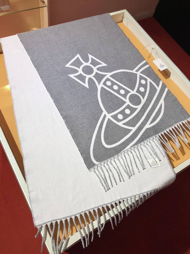 Rvw2401 recommends this Vivienne Westwood jacquard scarf from the high-fashion B