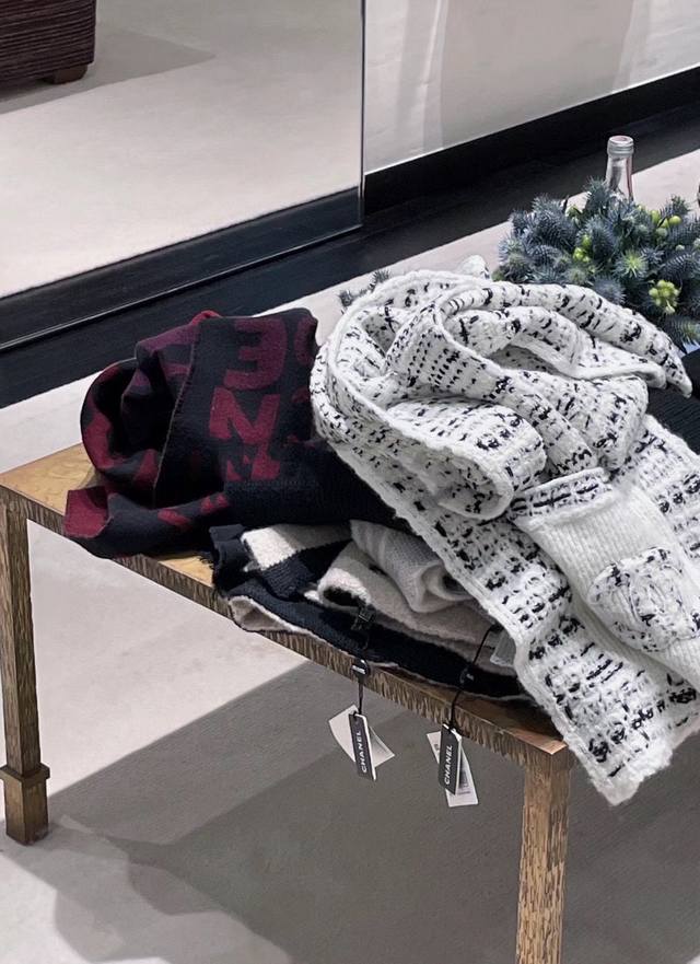 I absolutely love this Chanel knit scarf with pockets! It's sophisticated yet pl