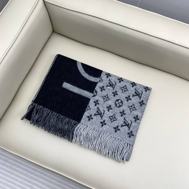 This celebrity-endorsed color-blocked cashmere scarf is already a limited editio