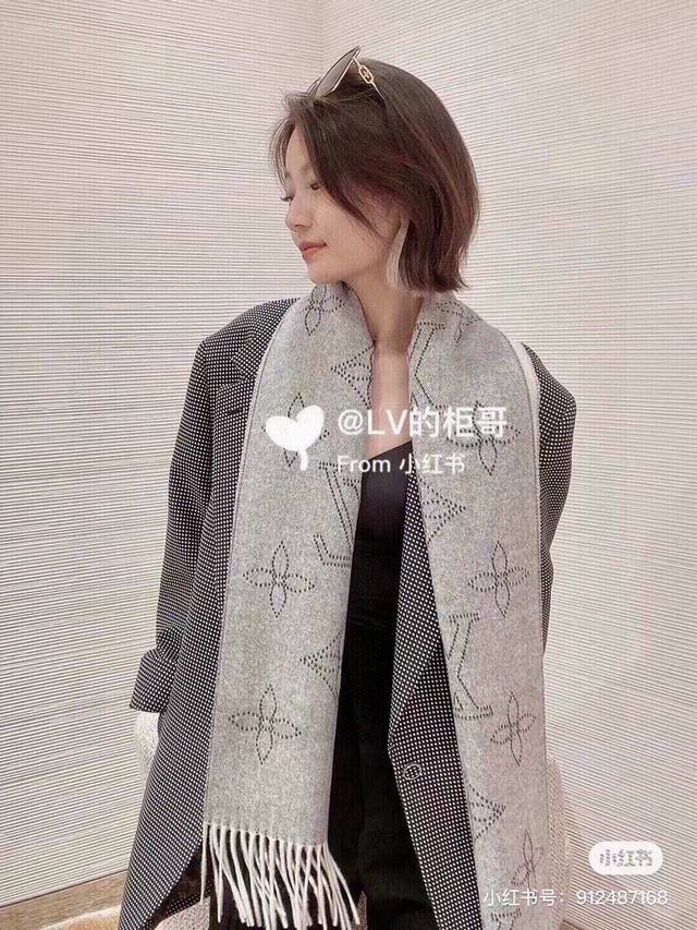 Louis Vuitton's new reversible scarf, Mahina Flight Mode. One side features a ja