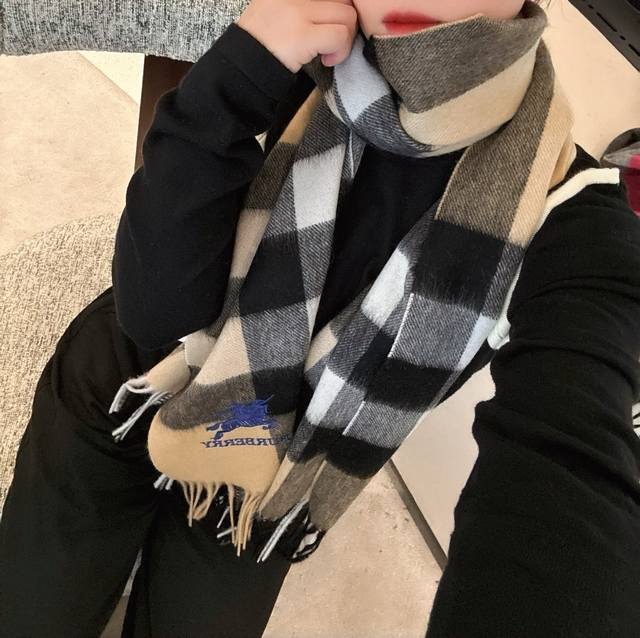 Burberry's camel-colored quilted scarf has been a staple for over a century, its