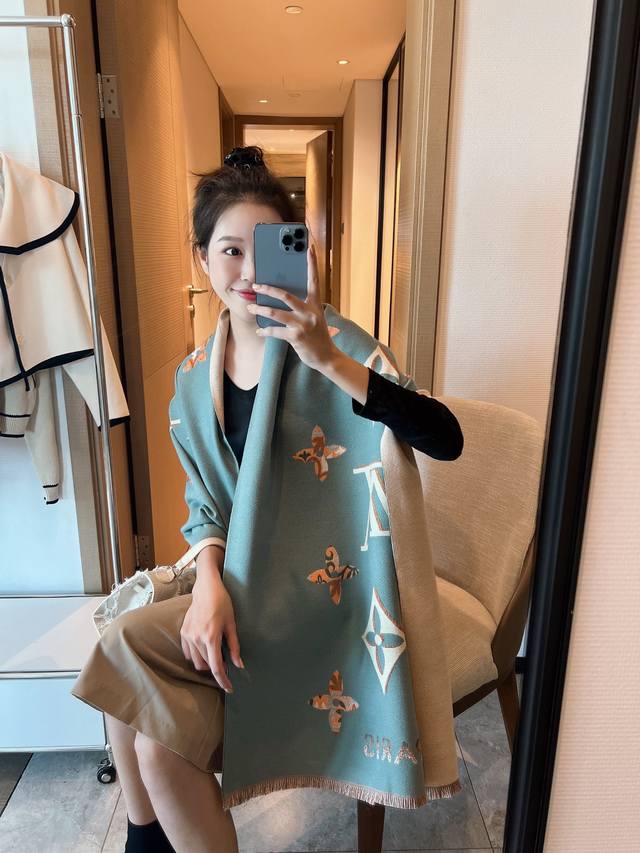 Louis Vuitton's superb quality and elegant LV shawl keeps you warm at all times.