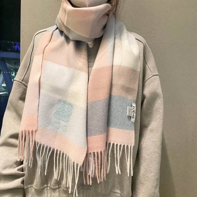 A rare high-end family perk: a Loewe scarf with exquisite embroidery! I love the