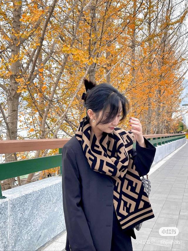 Fendi's trending online style, this Fendi knit scarf is instantly captivating. T