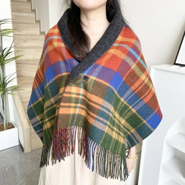 Vivienne Westwood's versatile shawl and scarf is finally here! This original Viv
