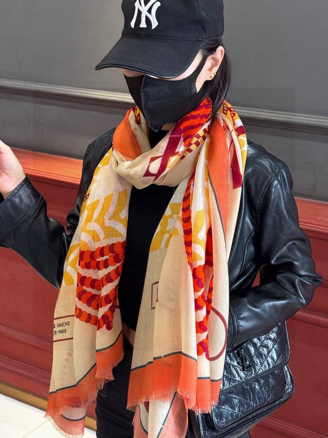 Hermes saddle cashmere scarf, sold in boutiques. Highly recommended for its top-