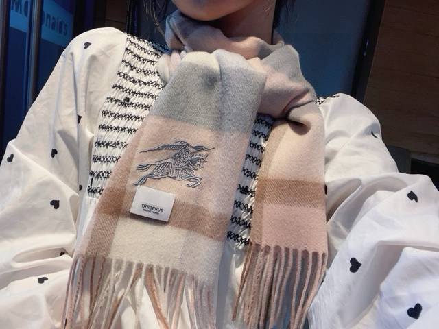 A subtly luxurious and exquisitely elegant scarf, perfect for the discerning eli