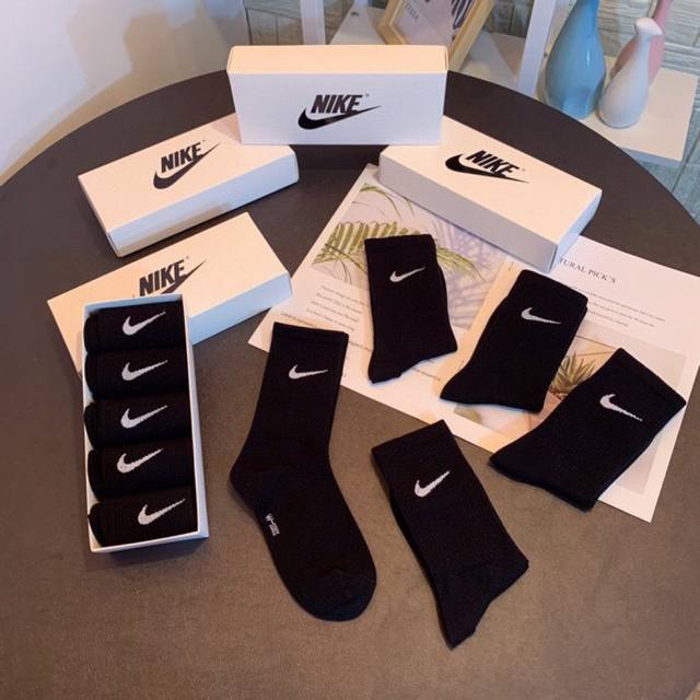 Special Packaging Nike New Classic Mid-Length Slouch Socks! Five pairs per box,