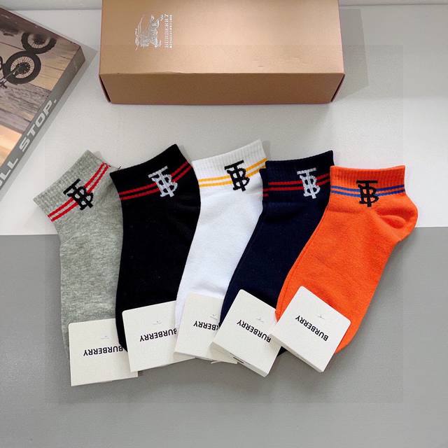 A box of 5 pairs of Burberry socks with packaging. These are a super popular sma