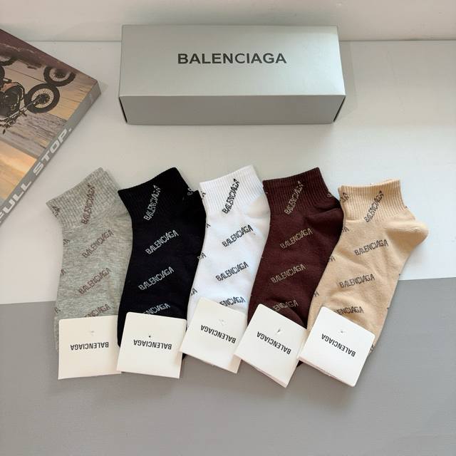 A box of 5 pairs of Balenciaga short socks with packaging. A must-have for fashi