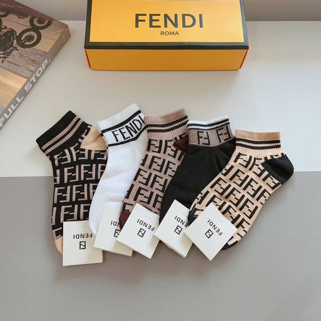 A box of 5 pairs of Fendi double F letter mid-calf socks, including packaging. M
