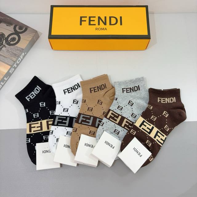 A box of 5 pairs of Fendi double F letter mid-calf socks, including packaging. M