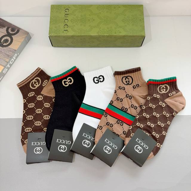 A box of 5 pairs of Gucci socks (including packaging). These are a super popular