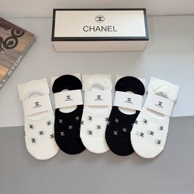 A box of 5 pairs of Chanel classic socks with packaging. High-quality bamboo cot