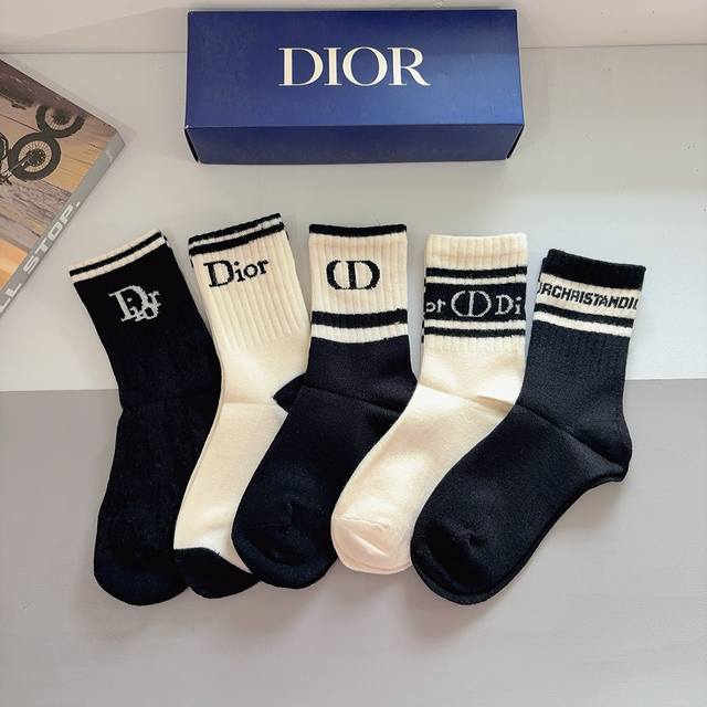 A box of 5 pairs of Dior's new logo rabbit fur mid-calf socks, including packagi
