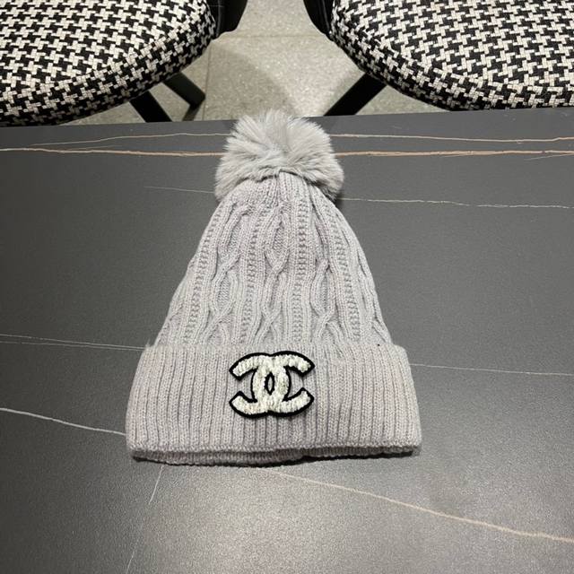 Chanel vintage double C knit beanie, a popular style among online influencers an