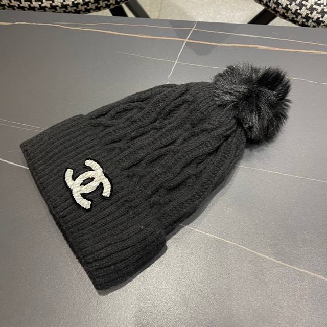 Chanel vintage double C knit beanie, a popular style among online fashionistas,