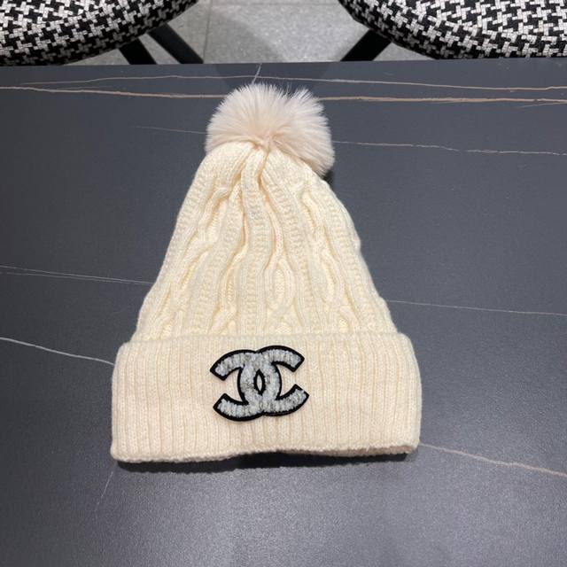 Chanel vintage double C knit beanie, a popular style among online influencers an