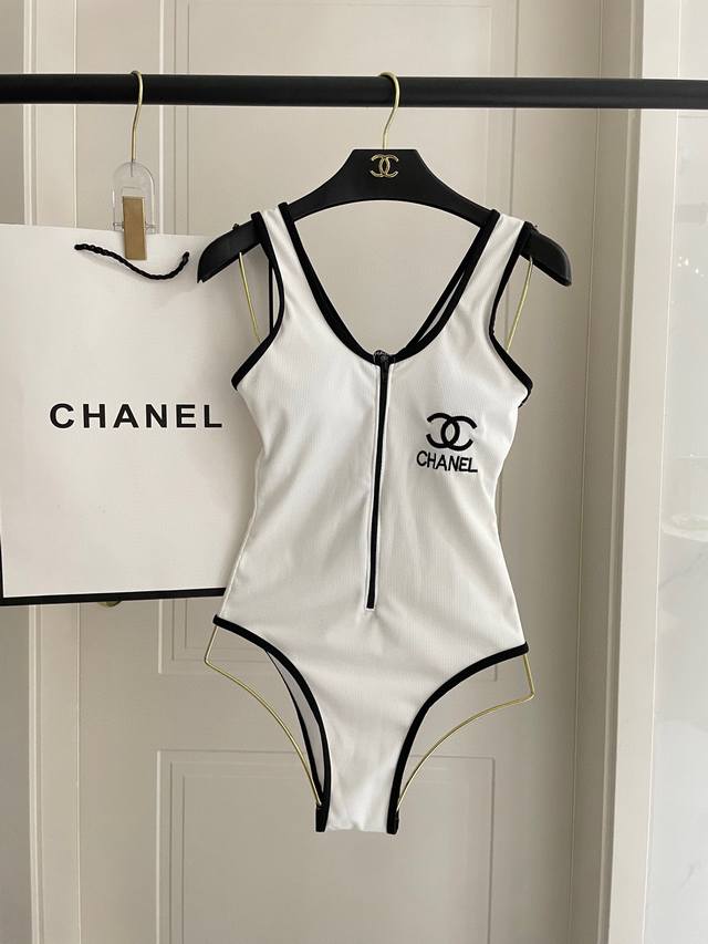 Chanel Vintage Onesie with Padded Chest This vintage onesie swimsuit can be worn