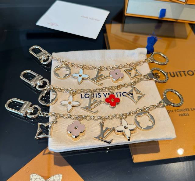 LV keychain/bag charm/chain pendant. This Fleur De Monogram bag charm chain focu