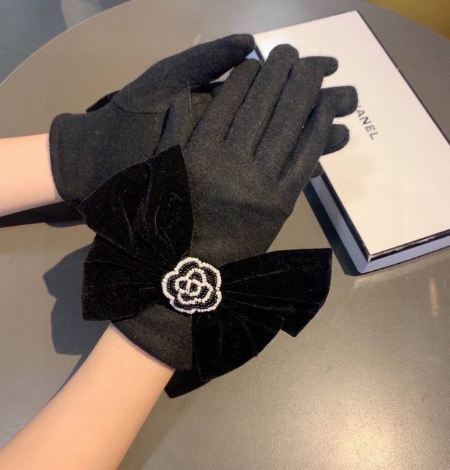 Chanel new arrival wool gloves from the boutique. Stylish gloves with beaded cam