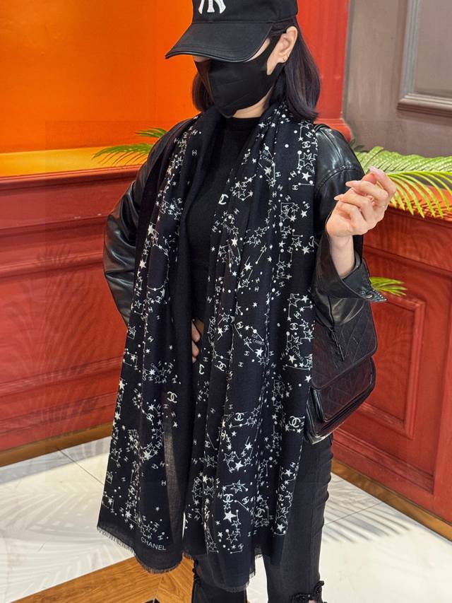 Chanel's classic design is elegant and sophisticated. A perfect scarf to wear ar