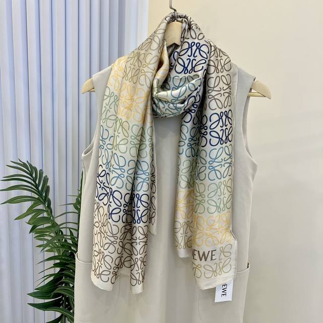 New Arrival! This new silk satin long scarf is truly breathtaking! The effect wh